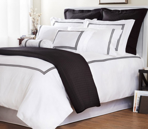 white comforter with black trim